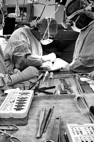 Operating room scene during a complex spine surgery